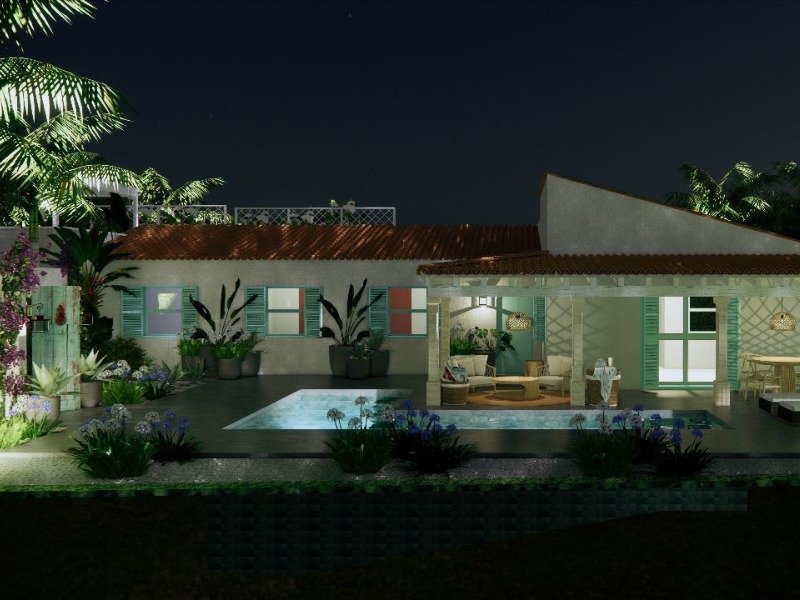 Piscina y jardín iluminado de noche